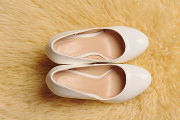 Pair of Shoes on Puffy Carpet