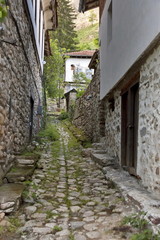 Fototapeta na wymiar Narrow street in ancient Melnik town, Bulgaria