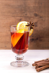 Hot Christmas tea with cinnamon, cardamom, cloves and orange