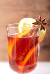 Hot Christmas tea with cinnamon, cardamom, cloves and orange