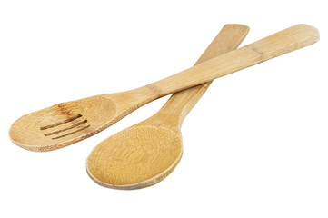 Wooden kitchen utensils on white background