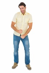 Smiling handsome man flexing muscles