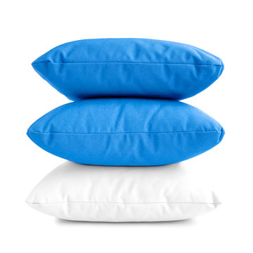 Stack of three cushions or pillows isolated on white background