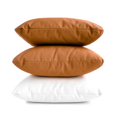 Stack of three cushions or pillows isolated on white background