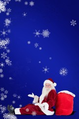 Composite image of santa sits leaned on his bag and has no clue