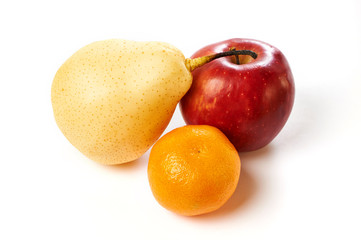 Pear, apple and tangerine isolated