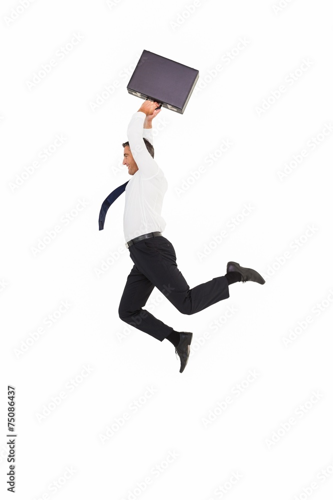 Poster smiling businessman leaping while briefcase