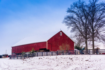 Red barn and snow-covered field in rural Adams County, Pennsylva