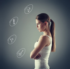 Concept of brainstorm and quest. Woman having thoughts