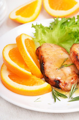 Pork chop with orange sauce