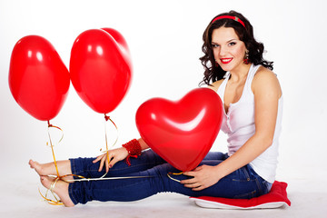 Sexy brunette with balloons heart. valentine's day