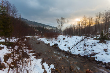 Fantastic winter landscape. Dramatic overcast sky.