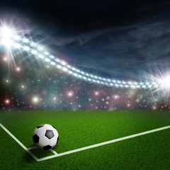 Fototapeta na wymiar soccer ball on the green field corner