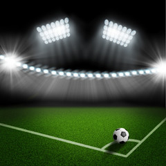 soccer ball on the green field corner