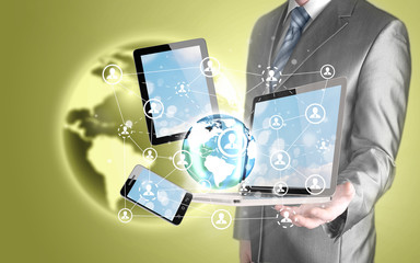 Business man using tablet PC and smartphone social connection