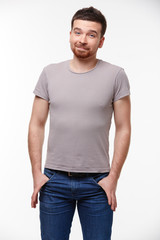 Fototapeta premium young man surprised, puzzled