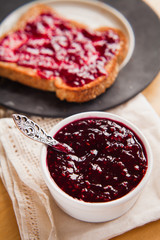 wild berry jam on slice of brown bread