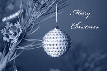 Christmas bauble on tree