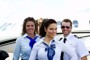Flight crew in front of plane