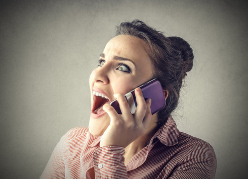Girl screaming at the phone