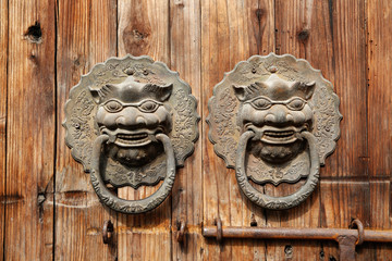 Rusty old Chinese door tiger knob