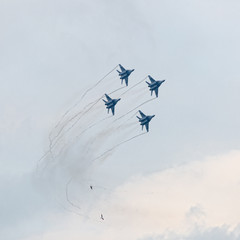 Four military jet planes in sky