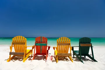 Papier Peint photo autocollant Caraïbes Colorful chairs on Caribbean beach