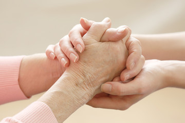 Helping hands, care for the elderly concept