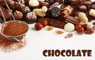 Delicious chocolate candies on white background
