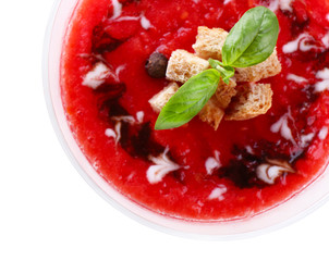 Gazpacho soup in glass bowl isolated on white