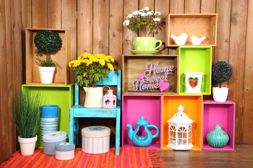 Beautiful colorful shelves with different home related objects