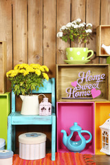 Beautiful colorful shelves with different home related objects