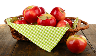 Wicker basket of red apples with napkin