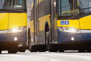 Side by side public transportation - bus.