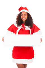 Beautiful christmas woman in santa hat with blank white board