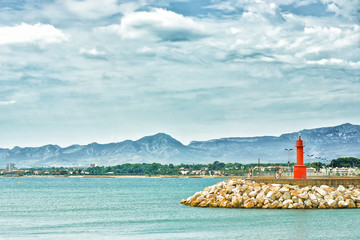 Lighthouse  in the port of Cambrils, Costa Dorada, Spain