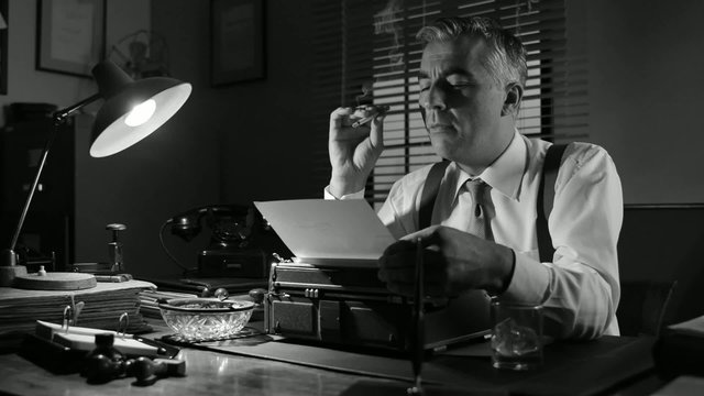 Vintage journalist working late at night