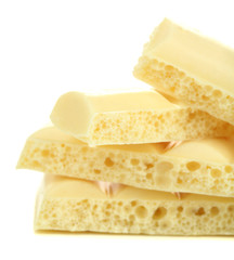Tasty porous chocolate, isolated on white