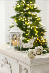 Christmas decorations with lantern on fir tree background