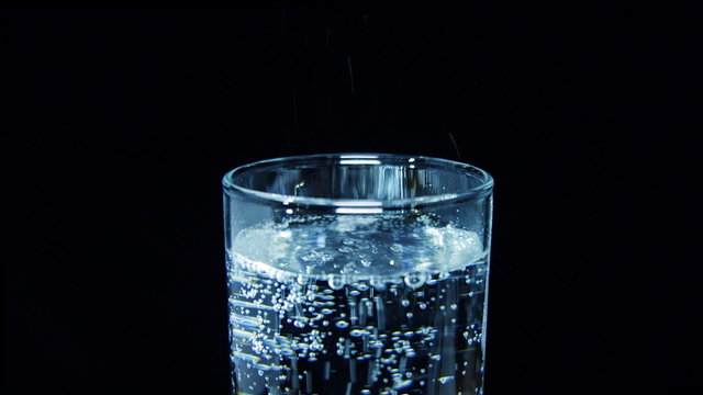 Bubbles in a glass of soda water