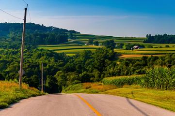 View of rolling hills and farms from a country road in York Coun