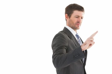 Businessman standing and pointing the finger