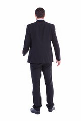 Obraz na płótnie Canvas Rear view of businessman standing