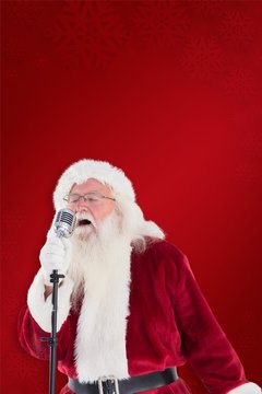 Composite image of santa claus is singing christmas songs