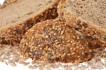 Slices  whole grain bread decorated with natural cereals.