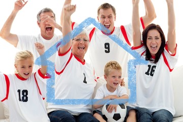 Fototapeta na wymiar Composite image of family celebrating a goal at home