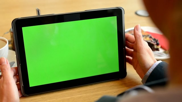 Woman Works On Tablet Green Screen In Cafe - Coffee And Cake