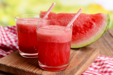 Juicy watermelon on table on bright background