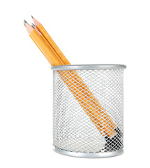 Wooden pencils in metal vase isolated on white background