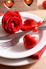 Festive table setting for Valentines Day on table background